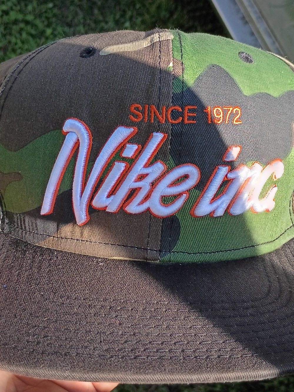 Nike SB Camo Snapback Hat with Orange Pennant Embroidery